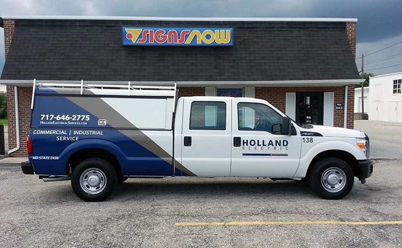 Signs Now Hanover has designed and installed a number of partial vehicle wraps for Holland Electric.